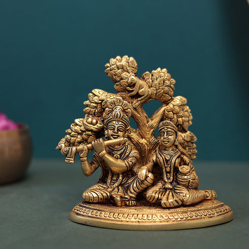 Divine love and devotion shared between Lord Krishna and Radha Idol In Brass