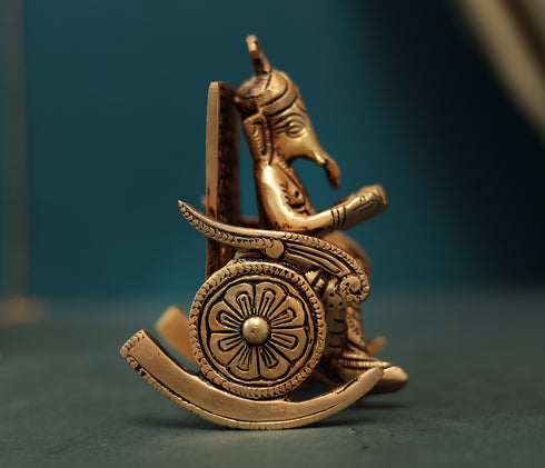 Superfine Reading Ganesha Sitting On Rocking Chair In 7 Inch