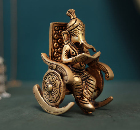 Superfine Reading Ganesha Sitting On Rocking Chair In 7 Inch