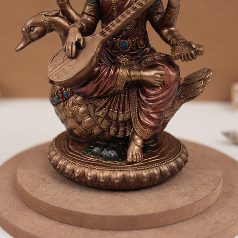 Goddess Saraswati in 8 Inches in Copper Finish