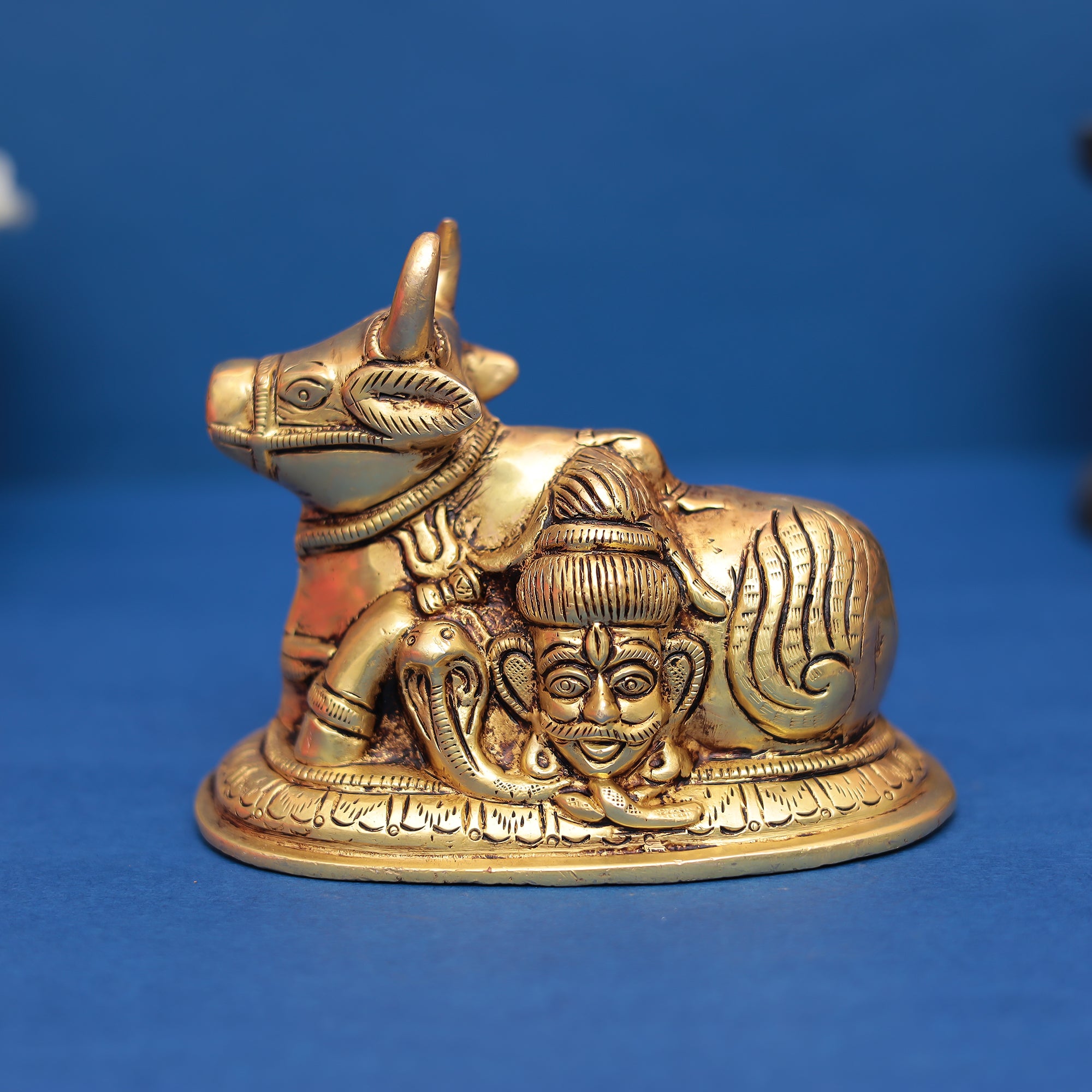 Premium Brass Nandi Idol Featuring Shiva Face Carving in 4 inches